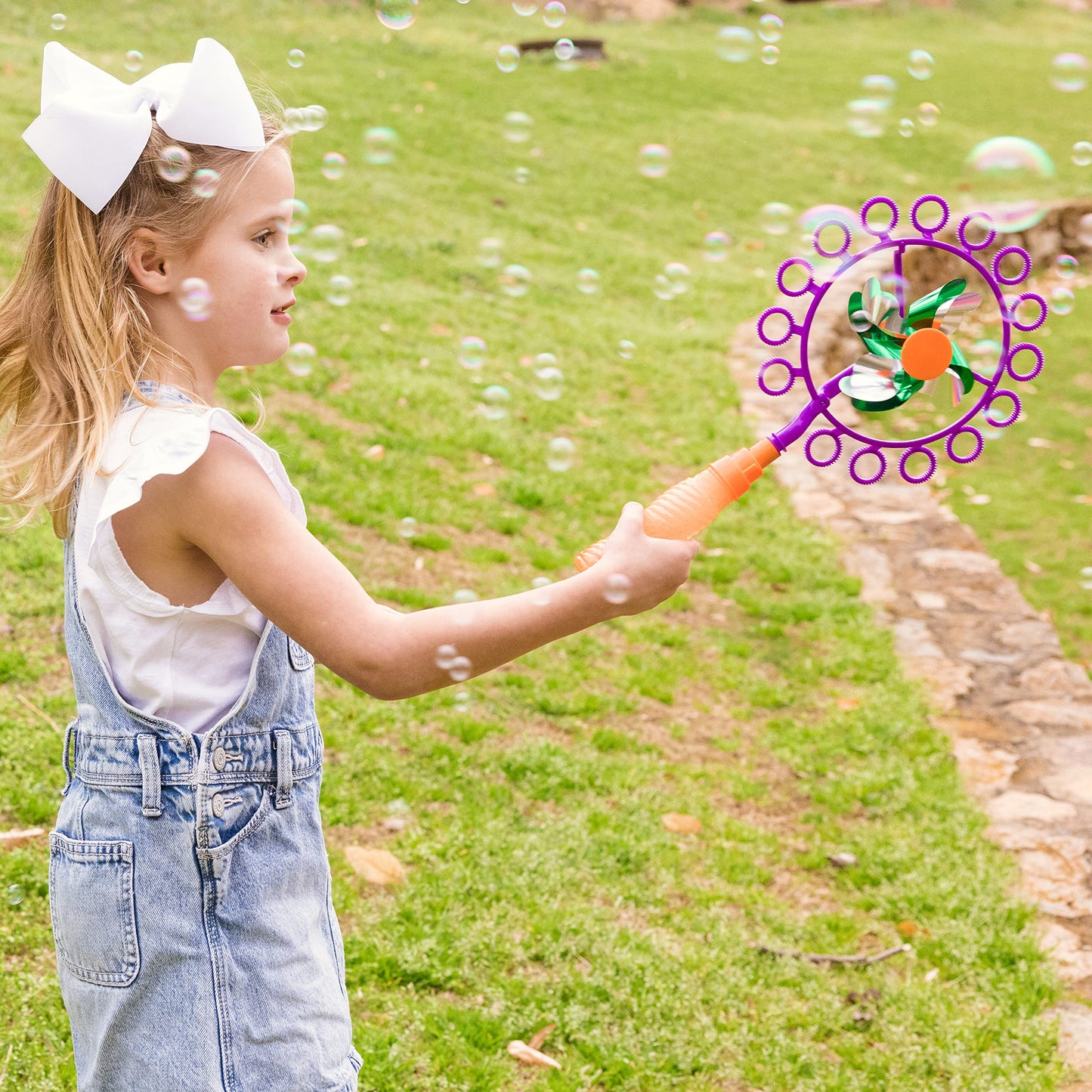 Sunny Days Entertainment Pinwheel Bubble Wand - Bubble Blower and Windmill Spinner - Colors and Styles May Vary